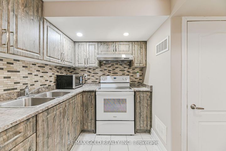 Photo 30 at 45 Treeline Boulevard, Vales of Castlemore, Brampton