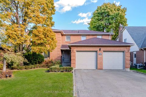 Photo 1 at 136 Mossgrove Trail, Windfields, Toronto