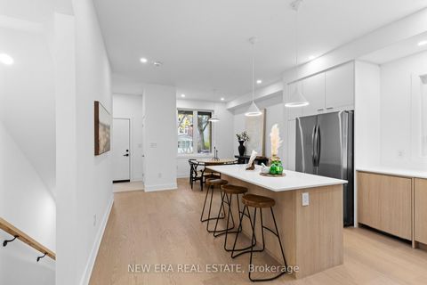 Photo 2 at 148 Rhodes Avenue, Coxwell, Toronto