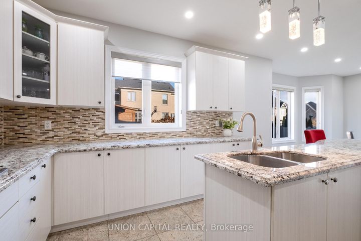 Photo 11 at 67 Royal West Drive, Credit Valley, Brampton