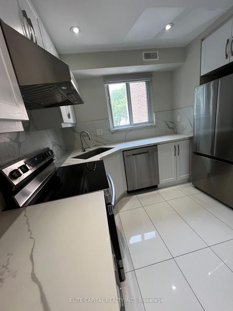 Photo 8 at 74 Thimble Berryway, Hillcrest Village, Toronto