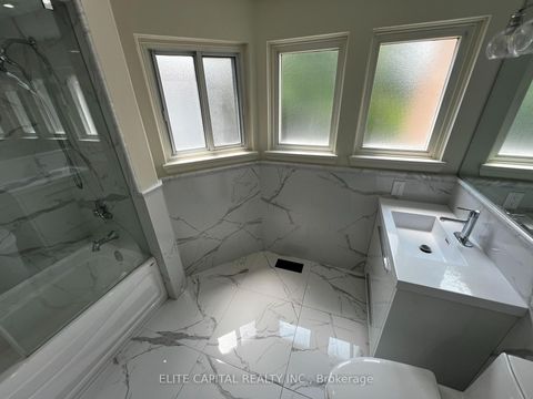 Photo 21 at 74 Thimble Berryway, Hillcrest Village, Toronto