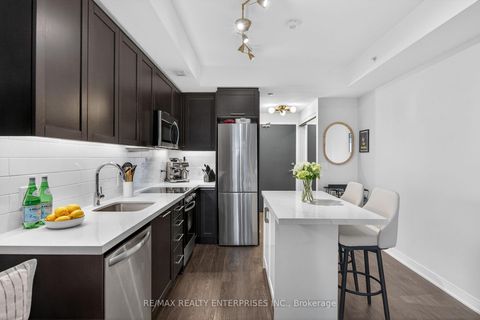 Photo 8 at 401 - 1 Neighbourhood Lane, Queensway, Toronto