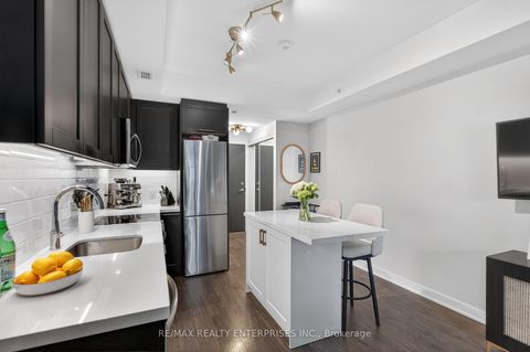 Photo 9 at 401 - 1 Neighbourhood Lane, Queensway, Toronto