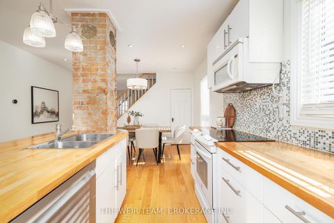 Photo 9 at 10 Eldon Avenue, Crescent Town, Toronto