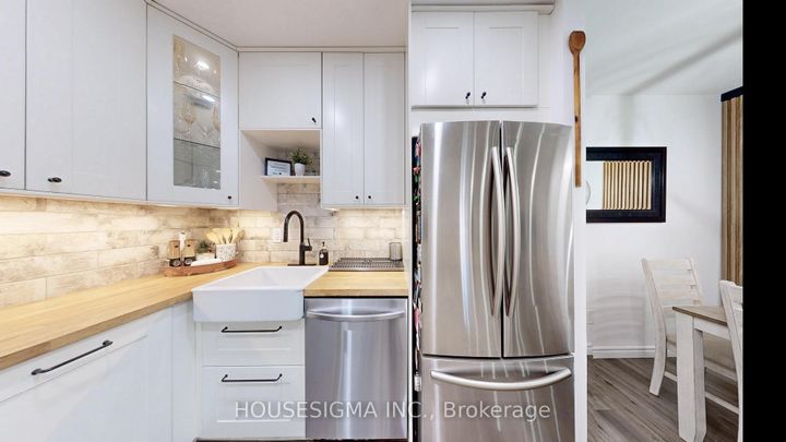 Photo 7 at 114 - 1496 Pilgrims Way, GA Glen Abbey, Oakville