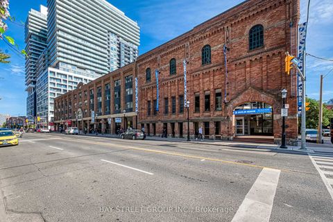 Photo 2 at 210 - 158 FRONT Street E, Moss Park, Toronto