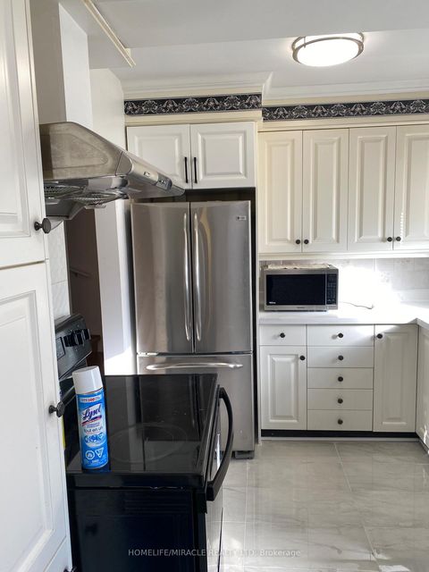 Photo 7 at 10 Sundridge Drive, Birchmount, Toronto