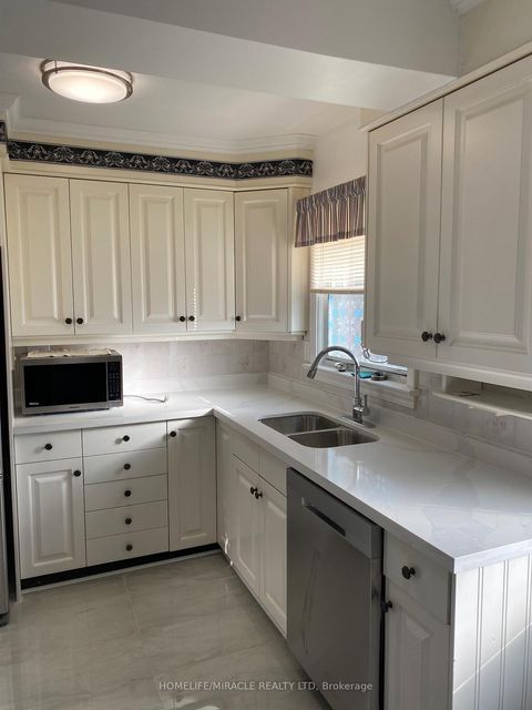 Photo 9 at 10 Sundridge Drive, Birchmount, Toronto