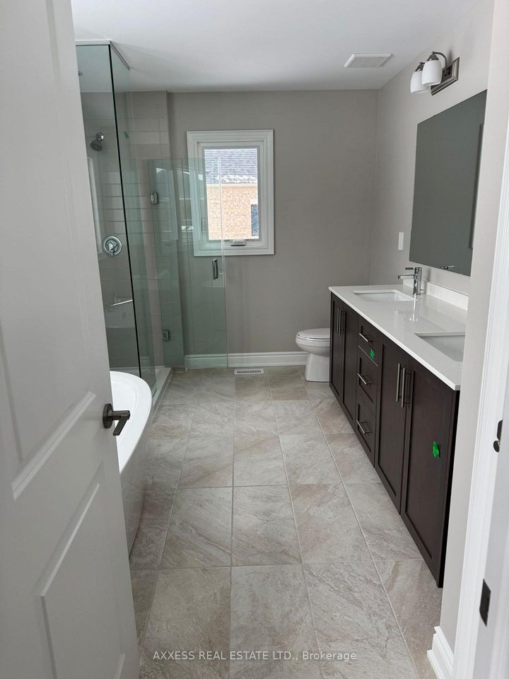 Photo 12 at 11 Misted Breeze Street, Bram West, Brampton