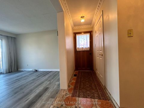 Photo 2 at 97 Reidmount Avenue, Malvern West, Toronto