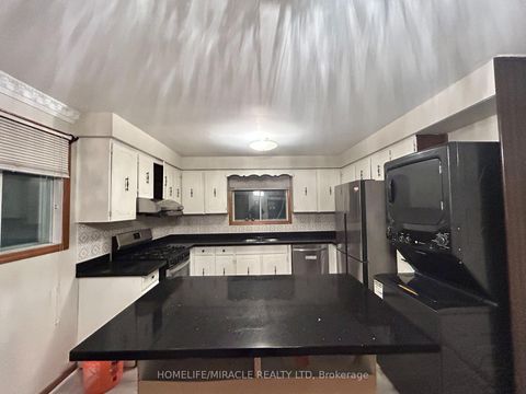 Photo 5 at 97 Reidmount Avenue, Malvern West, Toronto