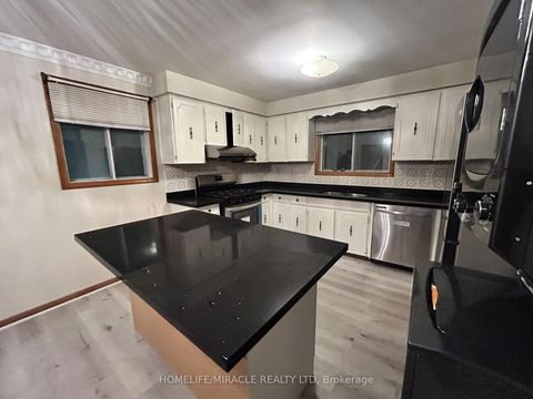 Photo 6 at 97 Reidmount Avenue, Malvern West, Toronto