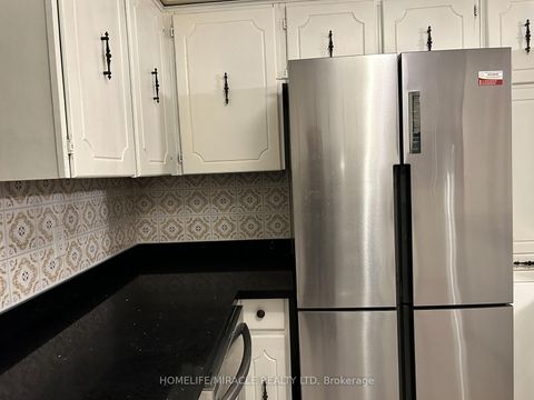 Photo 8 at 97 Reidmount Avenue, Malvern West, Toronto