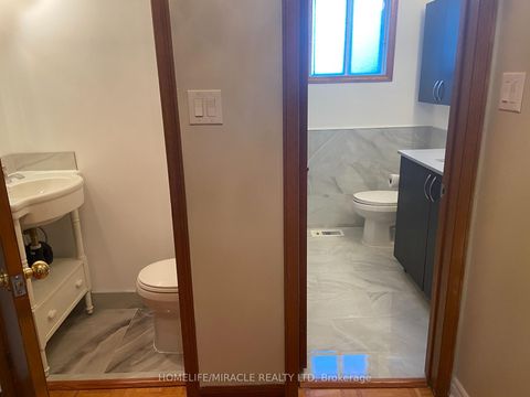 Photo 24 at 97 Reidmount Avenue, Malvern West, Toronto