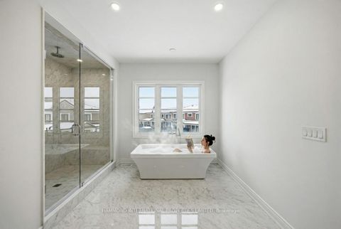 Photo 23 at 9 Lonergan Crescent, Steeles, Toronto