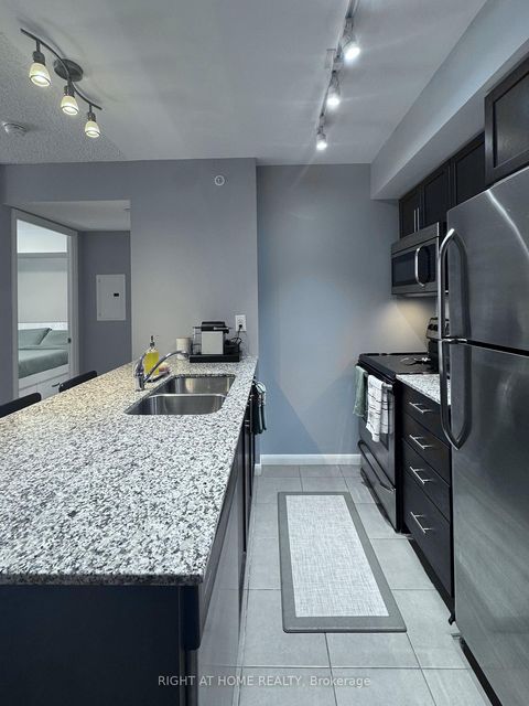 Photo 4 at 428 - 36 Via Bagnato, Glen Park, Toronto