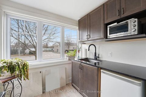 Photo 3 at 83 Industrial Parkway S, Aurora Village, Aurora