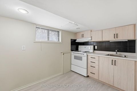 Photo 13 at 83 Industrial Parkway S, Aurora Village, Aurora