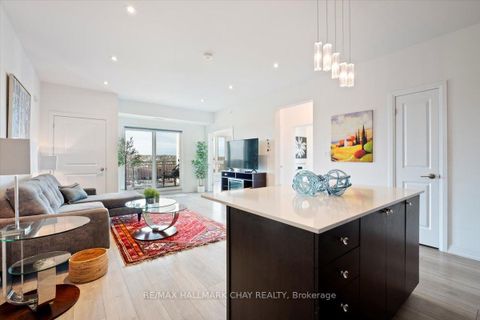 Photo 10 at 610 - 299 Cundles Road E, Alliance, Barrie