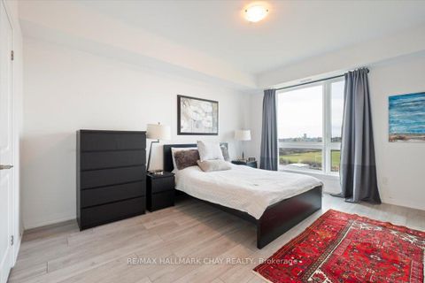 Photo 17 at 610 - 299 Cundles Road E, Alliance, Barrie