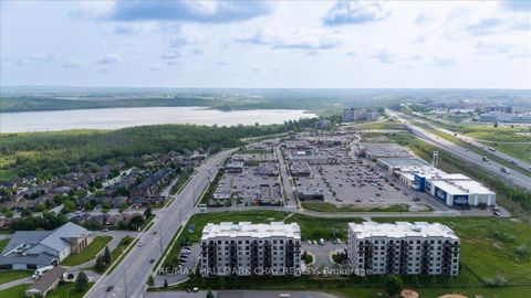 Photo 29 at 610 - 299 Cundles Road E, Alliance, Barrie