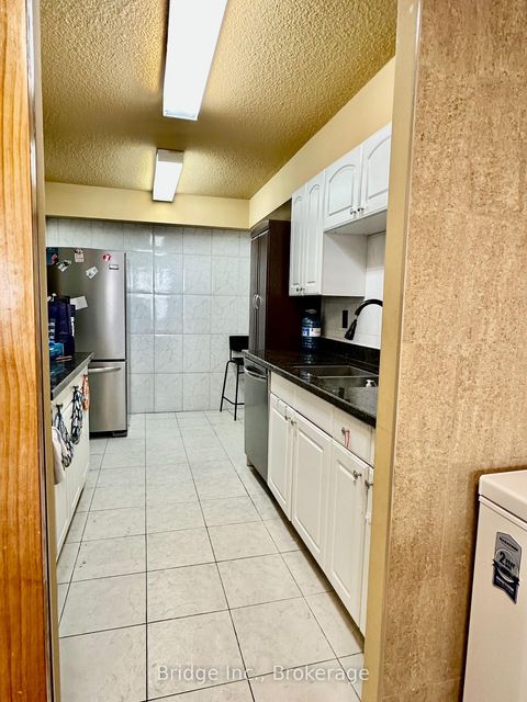 Photo 8 at 405 - 10 Tobermory Drive, Black Creek, Toronto