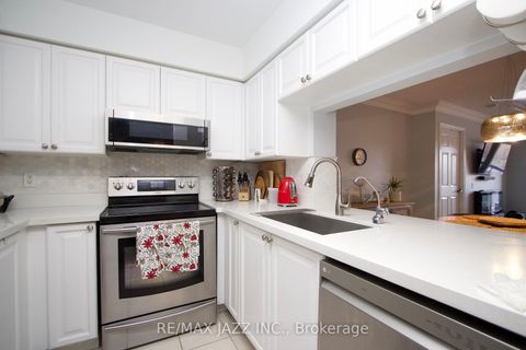 Photo 10 at 208 - 8 Mondeo Drive, Dorset Park, Toronto