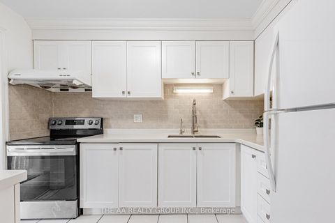 Photo 12 at 20 - 50 Bridletowne Circle, L'Amoreaux, Toronto