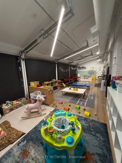 Photo 7 at 1415 Gerrard Street E, Coxwell, Toronto