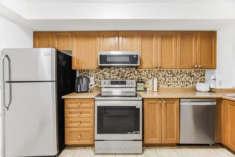 Photo 8 at 207 - 45 Strangford Lane, Birchmount, Toronto