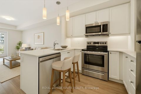 Photo 4 at 228 - 50 Lakebreeze Drive, Newcastle, Clarington