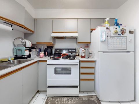 Photo 10 at 311 - 3233 Eglinton Avenue E, Scarborough Village, Toronto