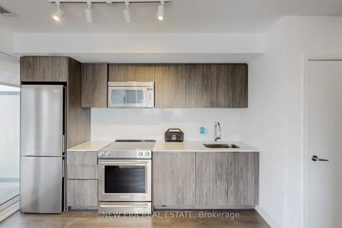 Photo 3 at 413 - 30 Samuel Wood Way, City Centre West, Toronto