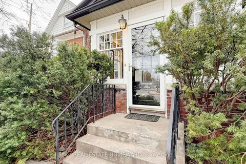 Photo 2 at 106 Dawes Road, Crescent Town, Toronto