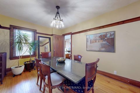 Photo 11 at 106 Dawes Road, Crescent Town, Toronto