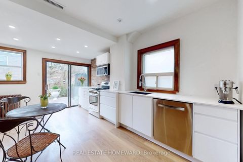 Photo 16 at 106 Dawes Road, Crescent Town, Toronto