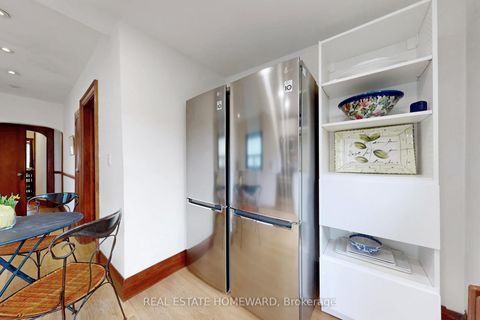 Photo 18 at 106 Dawes Road, Crescent Town, Toronto