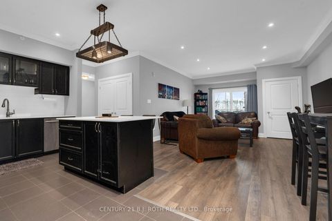 Photo 5 at 103 - 304 Essa Road, 400 West, Barrie
