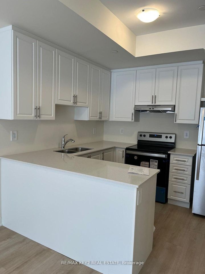 Photo 7 at 230 - 1695 Dersan Street, Duffin Heights, Pickering