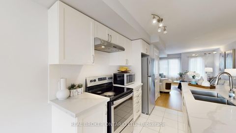 Photo 7 at 124 - 2500 Hill Rise Court, Windfields, Oshawa