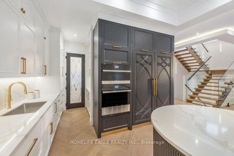 Photo 9 at 52 Child Drive, Aurora Highlands, Aurora