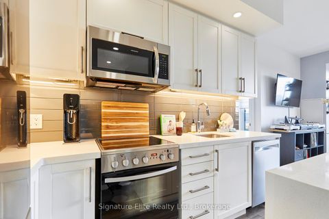 Photo 7 at 606 - 1 Neighbourhood Lane, Queensway, Toronto