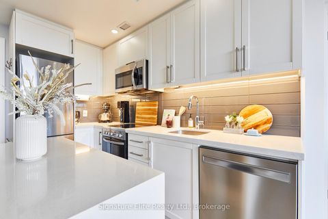 Photo 8 at 606 - 1 Neighbourhood Lane, Queensway, Toronto