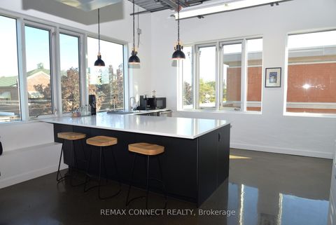 Photo 2 at 208 - 41 Industrial Street, Thorncliffe Park, Toronto