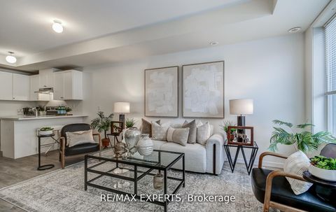 Photo 1 at 61 - 300 Alex Gardner Circle, Aurora Village, Aurora