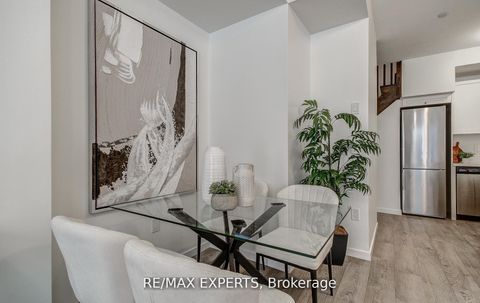 Photo 5 at 61 - 300 Alex Gardner Circle, Aurora Village, Aurora