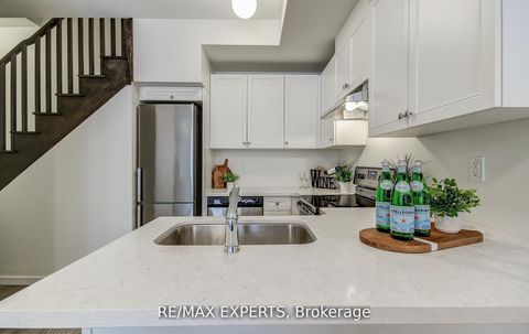 Photo 9 at 61 - 300 Alex Gardner Circle, Aurora Village, Aurora