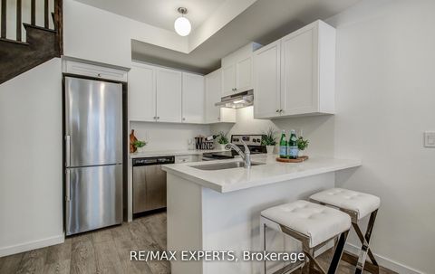 Photo 10 at 61 - 300 Alex Gardner Circle, Aurora Village, Aurora