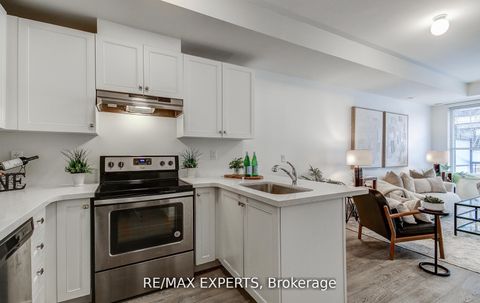 Photo 12 at 61 - 300 Alex Gardner Circle, Aurora Village, Aurora